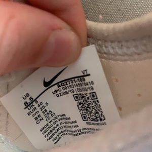 Nike tennis shoes, size 8.5 in women’s, a few stains, no odor